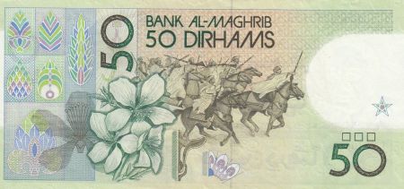 Maroc 50 Dirhams 1987 - Hassan II de face, charge militaire à cheval